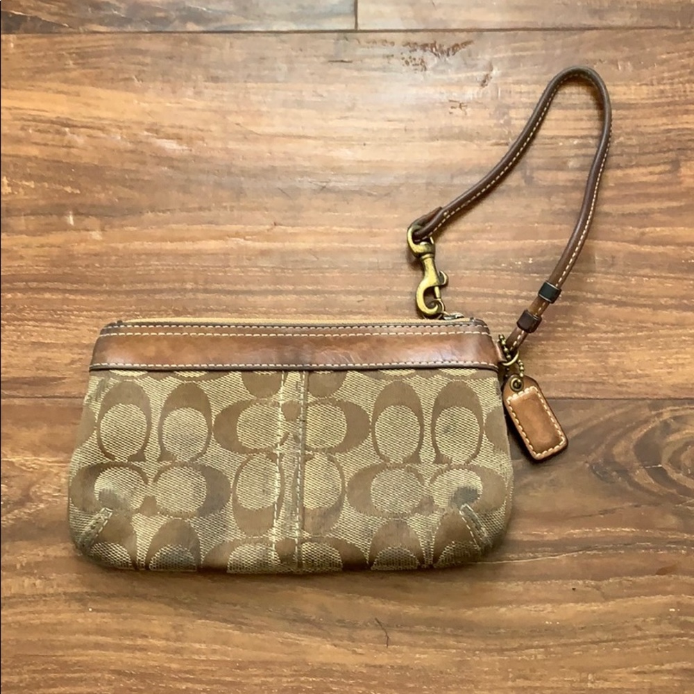 Well loved Coach wristlet